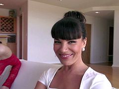 Pornstar Dana Dearmond in black skirt spreads her long legs on the edge of the couch and flashes her panties before she explores Jenna Justines sexy young tight body. She grabs her buttocks.