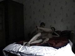 Brunette has sex on a wide bed