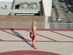 She's standing on the helipad wearing nothing but a pair of red heels. All the men will want to land their helicopters and see her. She heads into her penthouse with her man and kisses him and climbs on top of him to fuck.