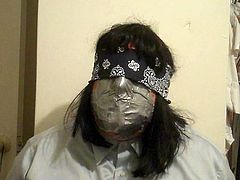 Being punished by Damselgrabber, smothered by duct tape.