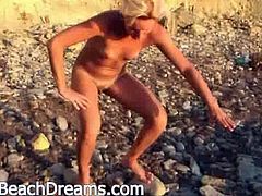 Nude Beach Dreams brings you a hell of a free porn video where you can see how a horny blonde poses and pisses on the beach while assuming very hot poses.