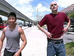 Get excited by watching this Asian boy, with muscular arms and a nice six pack, while he has anal sex with a gay man after getting his cock sucked.