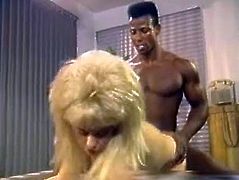 Amazing blond haired booty babe with awesomebody and nice ass gets her dripping pussy fucked hard missionary by the black cock. Have a look at this chick in The Classic Porn sex clip.