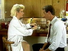 Sex appeal blonde takes off her white medical coat and kneels down to give deepthroat blowjob. Her red lips slide hard shaft up and down and she dreams of cum load.