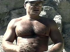 The sun is hot but these hard bodied muscled gay dads sizzle more in their outdoor cock stroking adventure to the max.