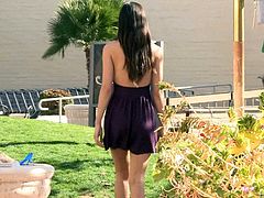 Curvy brunette outdoor in a purple miniskirt bends over showing her hot ass then fondles her natural tits before masturbating her pussy