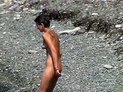 Horny voyeur loves spying on nude girls at the beach and watch them exposing their nude forms