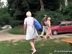 Nasty granny was tanning by the lake and after some beers later she was picked up by two horny and younger dudes. They totally destroyed her old cunt in the woods.