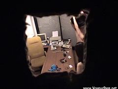 A sexy young brunette with long hair, big beautiful tits and a great body enjoys a hardcore threesome fuck in her office.