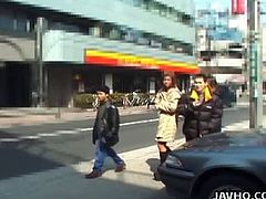 These two teens from Japan like to do naughty stuff, such as flashing their nice butts in public places. Two guys go with them and help them with the flashing.