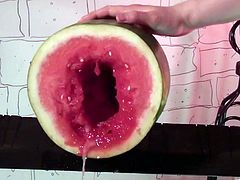 This horny dude with a nasty food fetish shoots a huge load of hot cum after screwing a watermelon as if it were a delicious pussy.