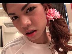 Asian shemale teenie gives blowjob