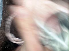 whacking it in  print thong.