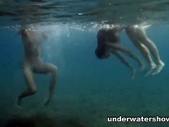 Defloration TV brings you a hell of a free porn video where you can see how these two naughty brunettes play together underwater while assuming very hot poses.