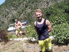 These two gay guys are out hiking in the back country and working up a sweat when they both get really horny. They decide to get sexual right there in the open. the hunk gets down on his knees and sucks the twink's cock on the trail.