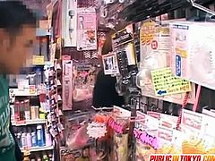 Saya Yukimi goes at a sex shop with two guys who decide to try a vibrator on her. They end up fucking her doggy style where everyone from the store could see them.
