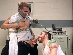 A guy finds himself completely helpless as two angry horny cocks have tied him up in a fierce rope bondage and have also mouth gagged him. Watch the tattooed man sucking nipples and performing a passionate and intense blowjob. The atmosphere gets even hotter as the dirty game is completed by vibrators.