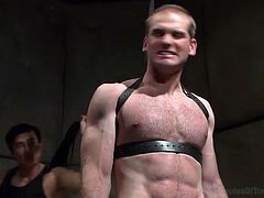 Tied with leather belts and ass whipped, our cute sex slave learns where his place is. the executor goes really rough on his ass, making it red and then grabs his neck and spanks his slutty face. All that bitch slaps and humiliation made our cheap gay whore hornier and ready for hard cock!