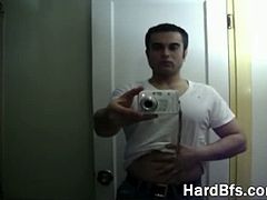 Handsome guy takes his clothes off and poses naked in front of webcam