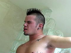 Skilled sucking head does her best in the bathroom and jerks off pierced cock
