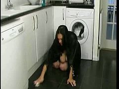 Watch this young busty housewife cleaning the kitchen. I great amateur clip for downblouse and big boob lovers