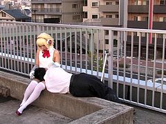 This Cosplay cutie is chilling out on the roof, when all of a sudden she gets very horny. The lovely girl heads inside, to wake up her man. When he rises, she gets his cock hard and sucks on it. Look at the blonde anime girl suck cock.