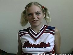 This cute blonde cheerleader has two cute pigtails and her sexy uniform on. She gets penetrated in her extra-tight pussy missionary style and likes it a lot.