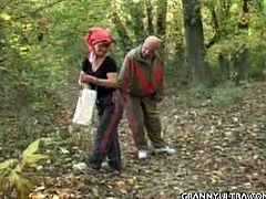 Granny Szandra was picking up something from the forest when she met an old man whose cock got inside her mouth in no time. She sucked on his old pecker nicely.