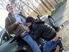 Classy gay in jeans giving massive dick blowjob before getting her anal smashed hardcore doggystyle infront of a car outdoor
