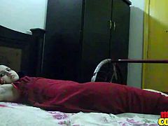 Indian couple is in their room all alone and started passionate kissing. The guy removes her panties and started to lick her cunt and finger fucking making her girl moan so much.