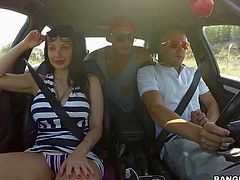 Big boobed brunette Aletta Ocean in black and white striped dress gets her pussy rubbed by curious guy during the ride. She gives great car blowjob with another guy in the backseat.