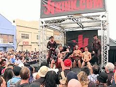 These boys feel good on the stage. Being in the middle of the attention makes them horny as hell and that crowd demands a hot show. They kneel, fuck and feel the magic as an executor humiliates them in front of the public. Damn this is hot so don't miss the rest of it!