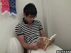 Ken is a Japanese dude who is reading a cartoon porn magazine. An Indonesian twink goes in his dorm room and barebacks him after they warm up with oral jobs.