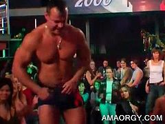 Muscled stripper dancing with lucky party girls at CFNM orgy