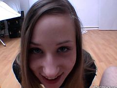 Cute brunette gets on her knees and gives a POV blowjob