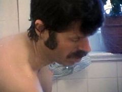 Ebony cutie provides moustached dude with blowjob in the bathroom