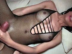 Nana and her FAT THICK COCK is barebacked in a black fishnet bodysuit. Nana swings her large dick, stroking her cumfilled knob then presents her well-trained asshole. Watch this hot and sexy shemale getting drilled hard. Enjoy!