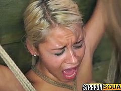 If you're attracted to slutty babes who love tough bdsm practices, dare to click and enjoy the sight of helpless Marsha's wet cunt... The naked blonde is tied up with ropes, so her dominant lesbian companion can easily have access to her pussy. The game would not be complete without a dildo and a strap on.