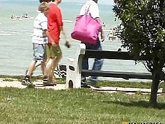 On the seashore girl pissing