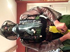 rainsuit,waders and gas mask