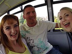 Pretty redhead Anna Darling bares her huge natural tits and gives nice bus blowjob. Sweet busty girl sucks dick side by side with curious blonde. She is hungry for cock too!