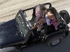 Busty girls drives around on the sand