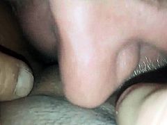 Licking her horny pierced pussy closeup