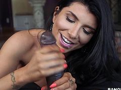 Naughty Romi's lusty desires are finally catching shape, where she finds herself in the presence of an ebony partner, blessed with a huge cock. See the smokey tattooed brunette, sucking it passionately and then, riding it like a tigress. Enjoy the sexy details!