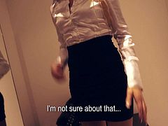 Long haired charming blonde Sunshine in smart office suit strips down to her white underwear before changing clothes. She unbuttons her blouse on camera in a fitting room.