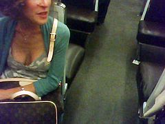 downblouse braless in Paris subway