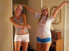 Two blonde with shorts dancing