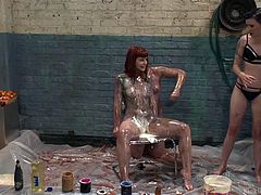 Do you want to learn all about the sensual art of sploshing? Check out this video, to see how sexy it can be to rub food all over your partner. In this video, three girls get intimate with chocolate sauce and whipped cream.