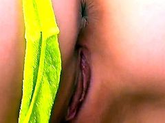 Naughty Japanese MILF Kou Minefuji in barely there pink and yellow bra and black stockings plays with her asian bush for you to watch and enjoy. She rubs her clit with her fingers and then has fun with vibrator.