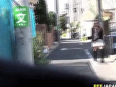 Asian babe has to pee